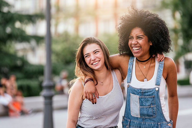 Beautiful women having fun in the street