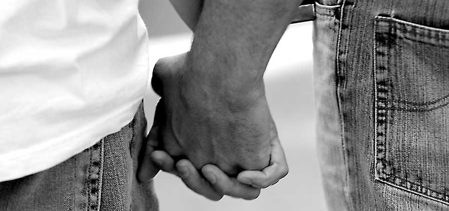 Men Holding Hands black and white