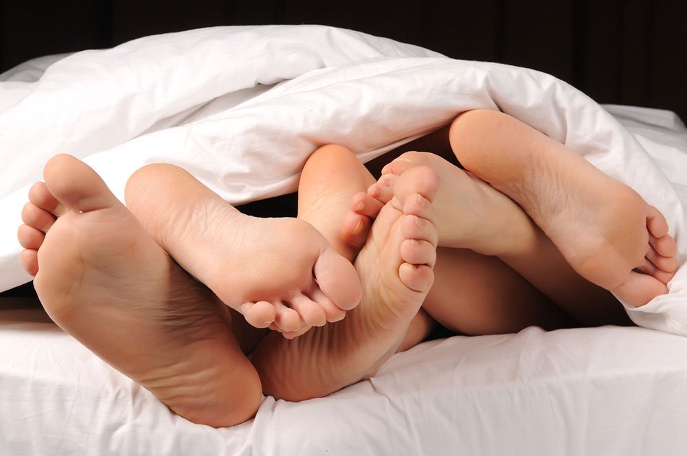 feet in bed